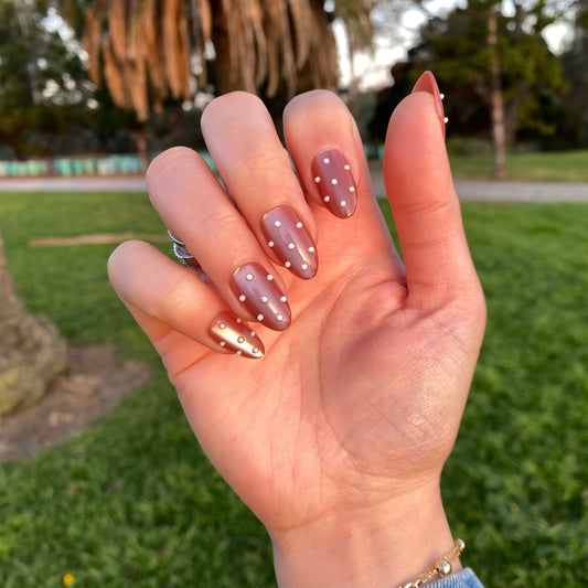Pearl dot mauve press-on nails with gold chrome accent nail