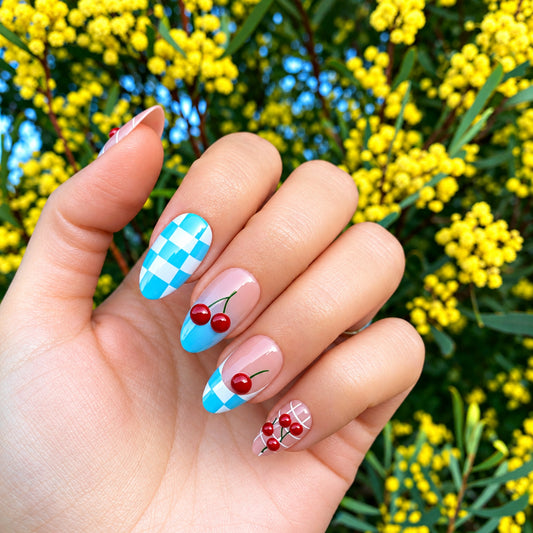 Cherry checkered press-on nails side view