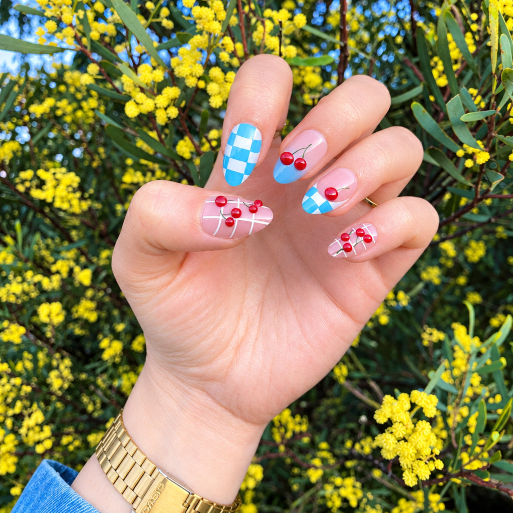 Cherry checkered press-on nails front view