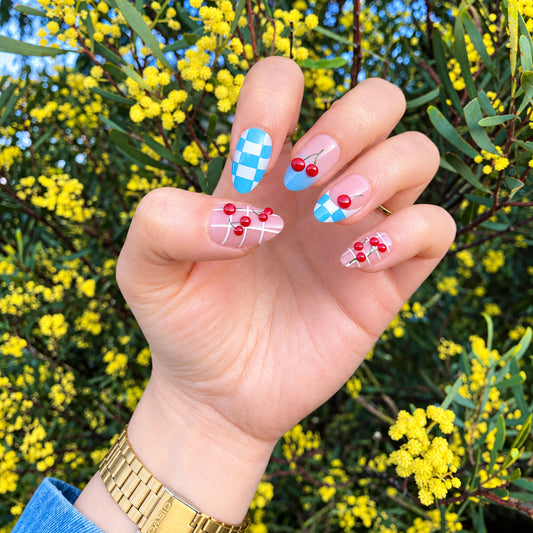 Cherry checkered press-on nails front view